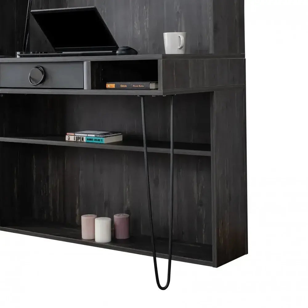 Black Desk with dark gray wood finish, hairpin legs, and integrated shelving for Lynda Kids
