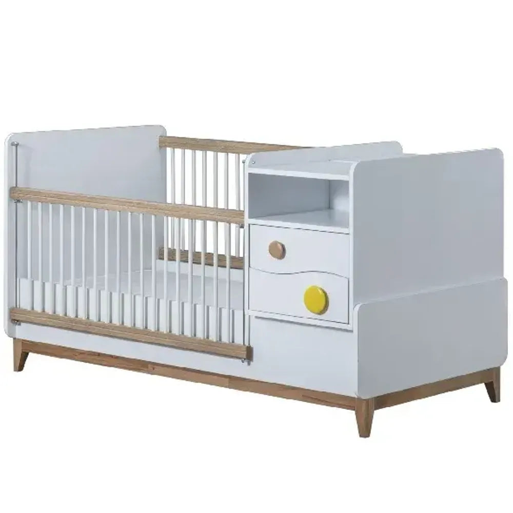 White wooden Bonita Crib with integrated changing table and storage width by Lynda Kids
