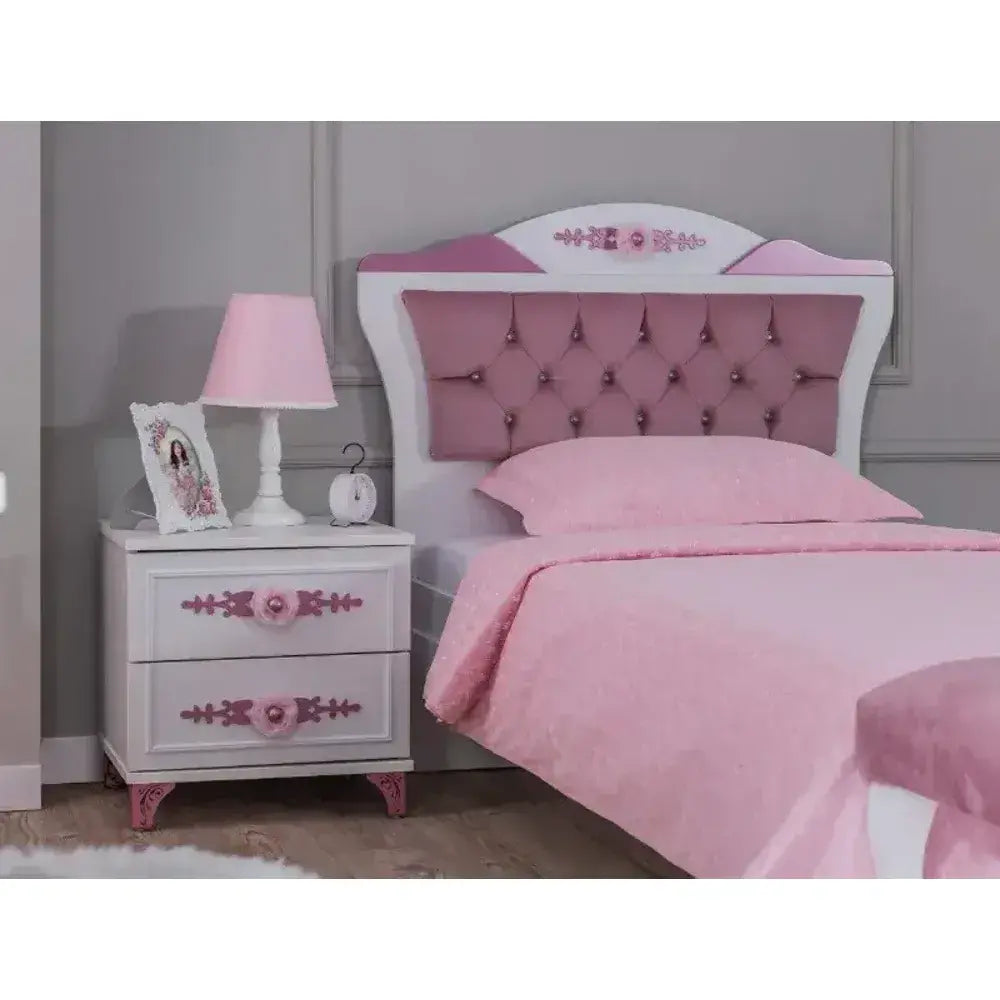 Queen Bed by Lynda Kids featuring a white and pink single bed with tufted headboard
