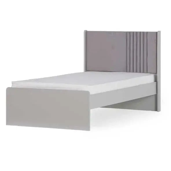 Elegant bed with light gray frame and padded pleated headboard for Lynda Kids
