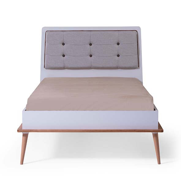 Retro Bed by Lynda Kids featuring a white single bed with tufted upholstered headboard