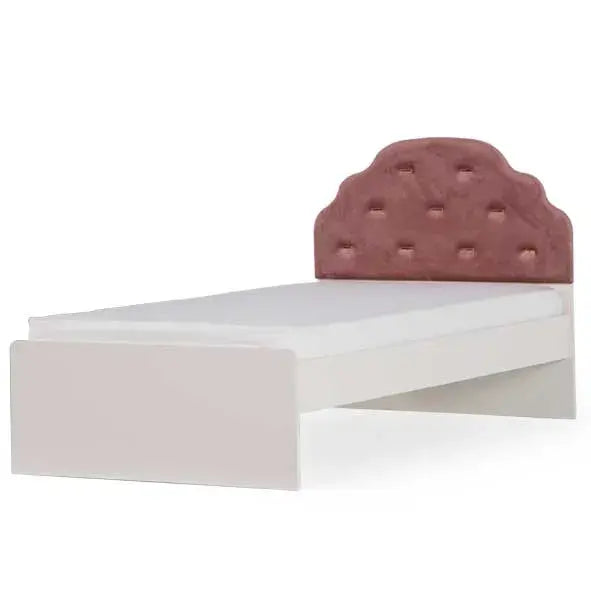 White single bed with pink tufted headboard in the Rose Bed collection by Lynda Kids