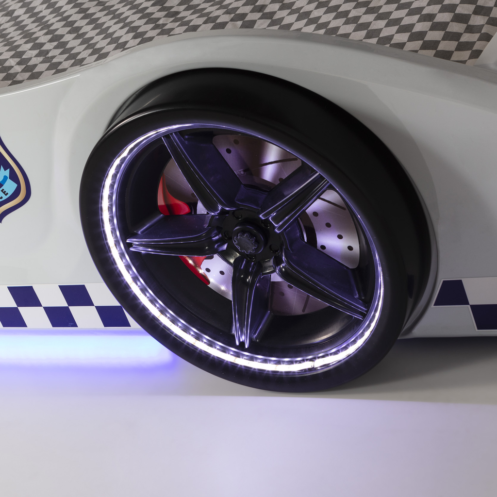 White toy race car bed with illuminated wheels and checkerboard patterns, Thunder Police Car Bed