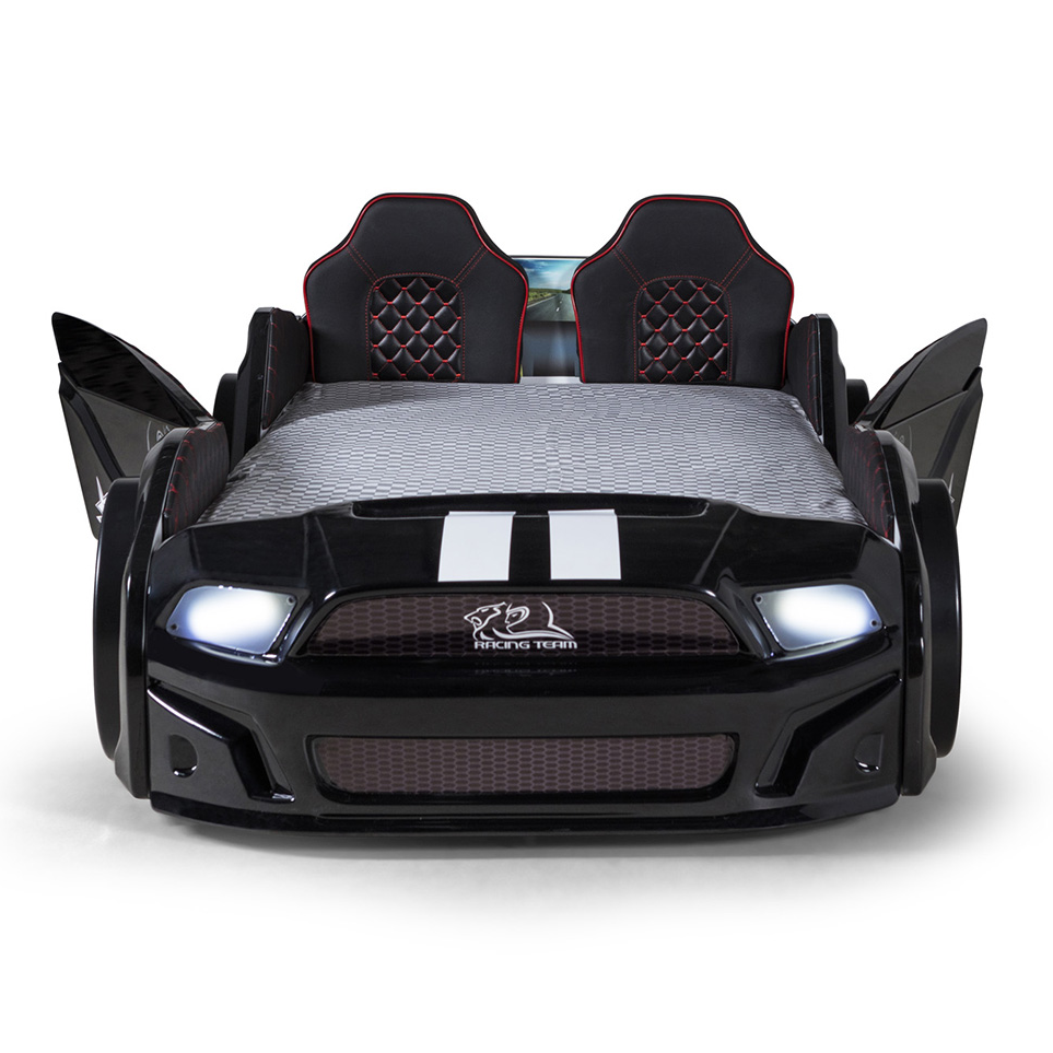 Black muscle racer car bed with racing seats and illuminated headlights for kids’ bedroom