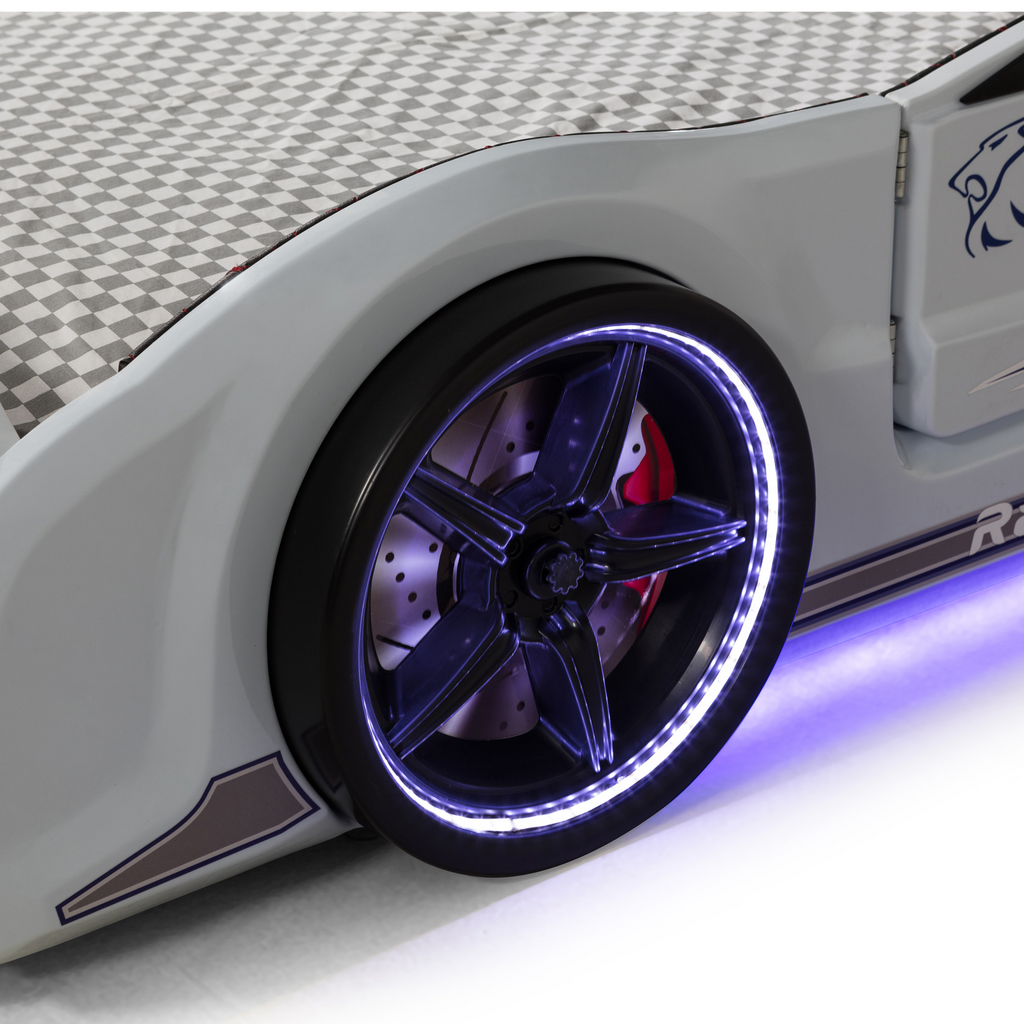 White Muscle Racer Bed with Checkered Bedding and Purple Underglow Lighting