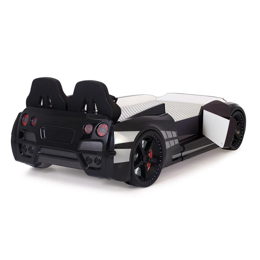 Black and white GTR Racer Bed with car shape, bucket headrests, large wheels, and textured sleeping surface