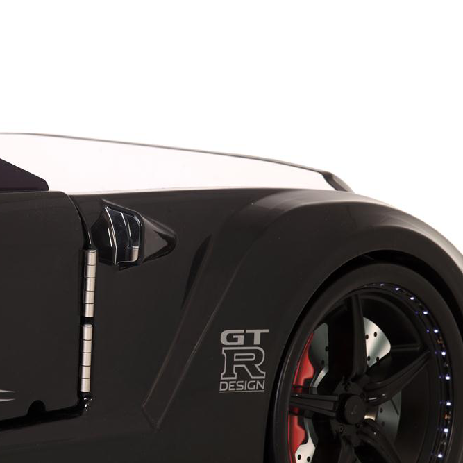 Black Nissan GT-R toy car with GT-R Design emblem on GTR Racer Bed for GTR car enthusiasts