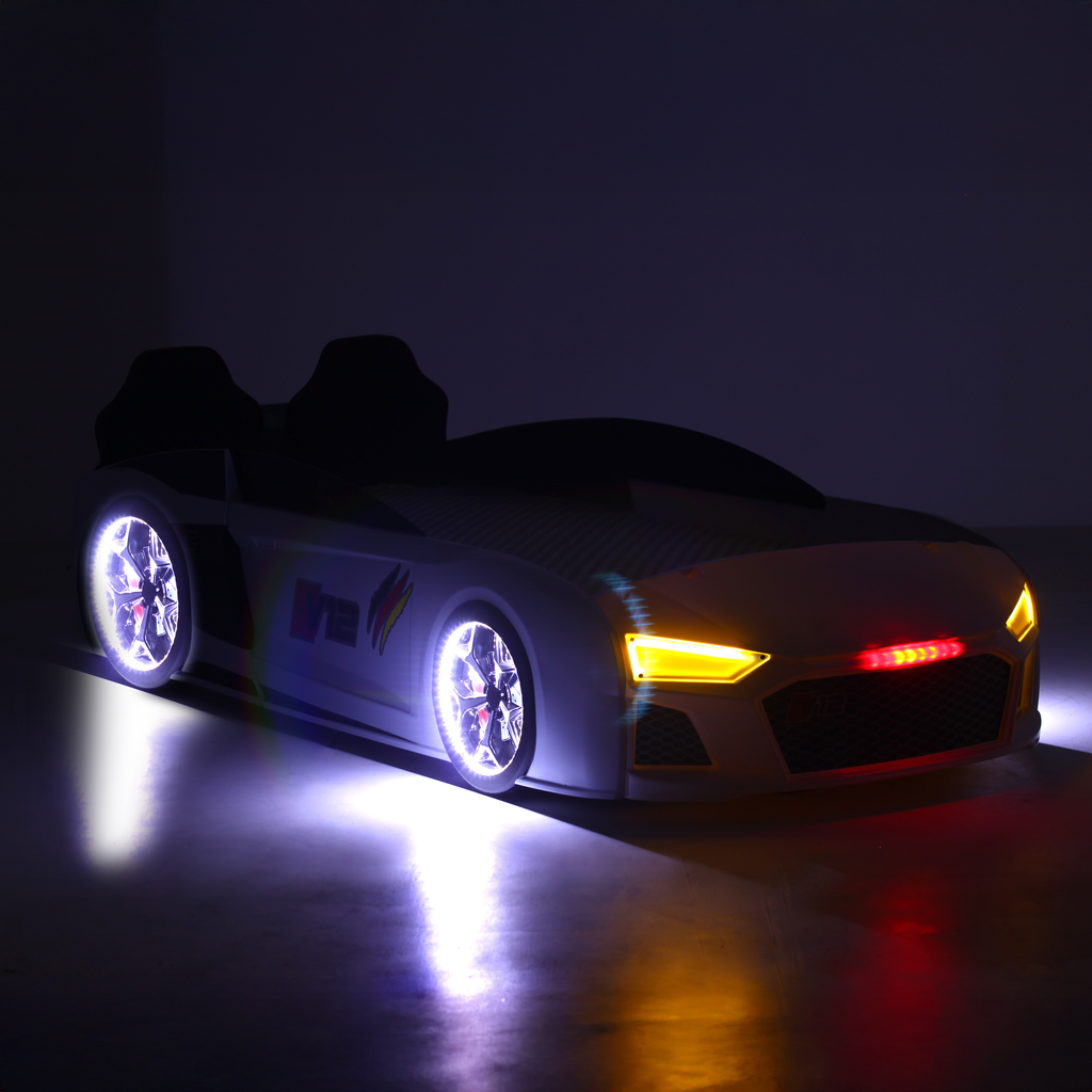 V12 Racer Bed by Lynda Kids featuring white race car design with working lights
